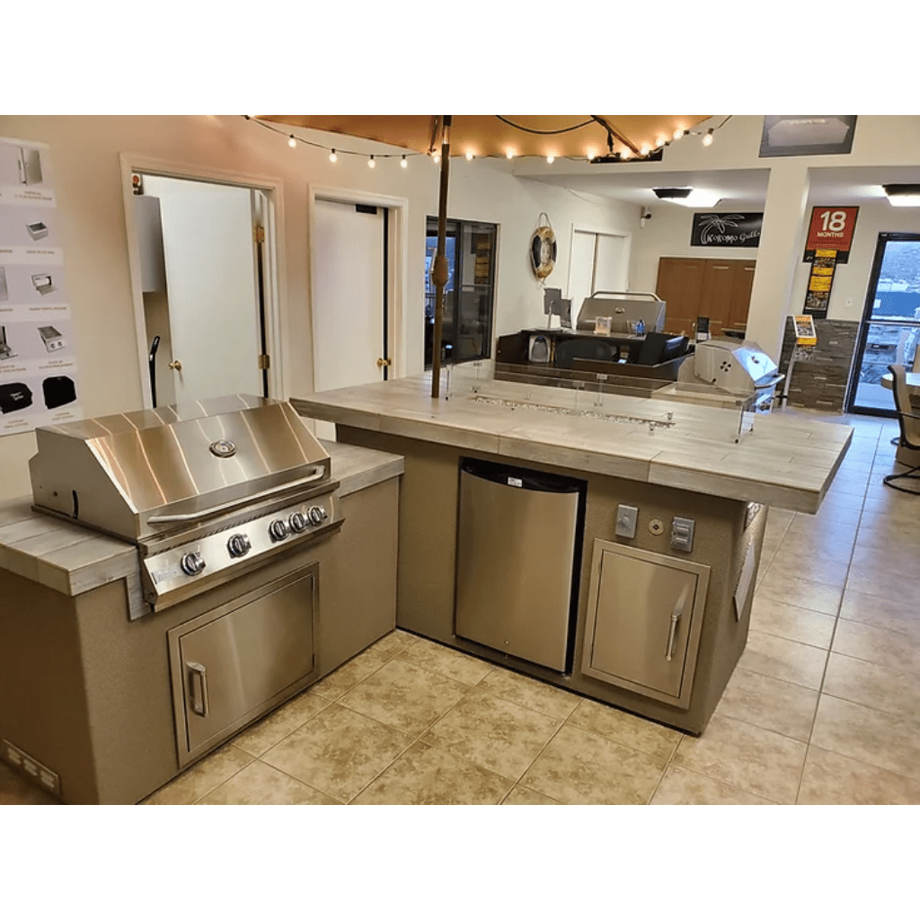 http://grillcollection.com/cdn/shop/files/Kokomo-Grills-L-Shaped-Built-In-BBQ-Island-with-Firepit-4-Burner-BBQ-and-Outdoor-Rated-Refrigerator.png?v=1686369392