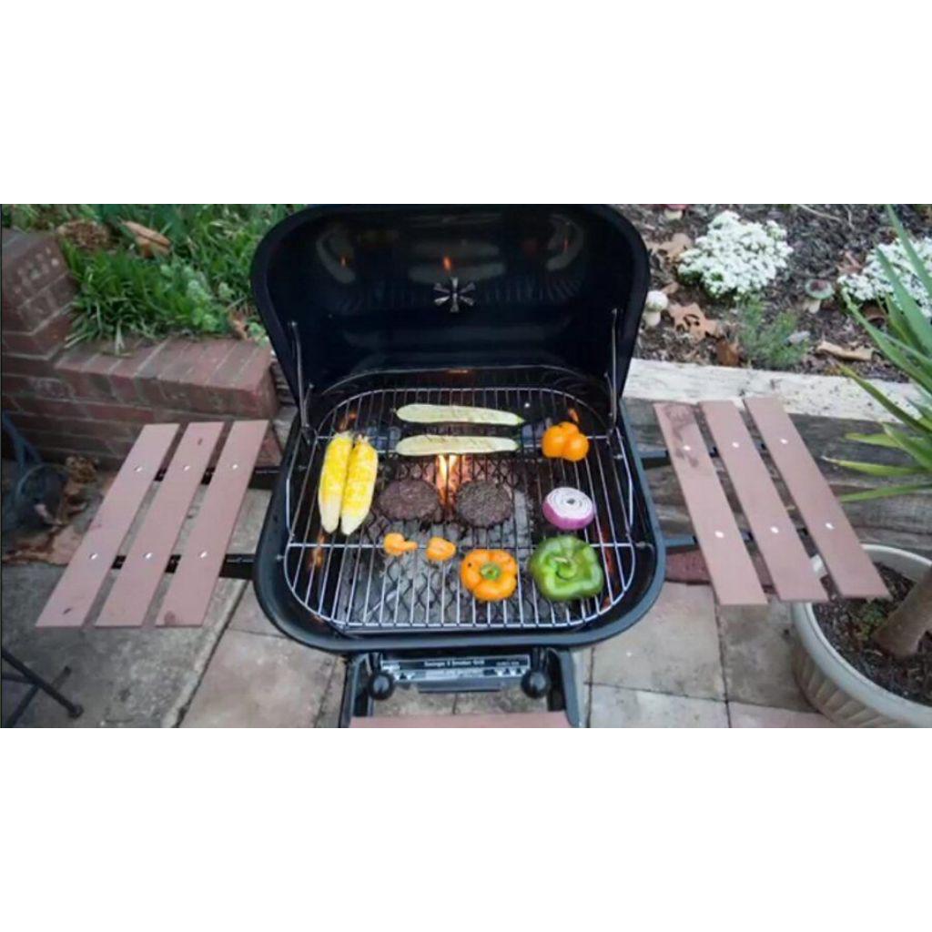 Americana 25" Black Swinger Charcoal Grill with an Adjustable Six-Position Cooking Grid