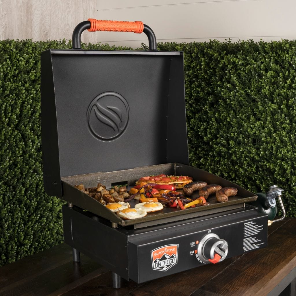 https://grillcollection.com/cdn/shop/files/Blackstone-17-On-The-Go-Tabletop-Propane-Gas-Griddle-with-Hood-5.jpg?v=1685822252&width=1946
