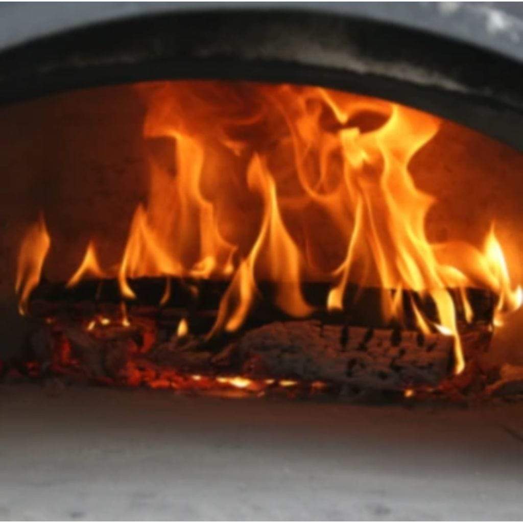 Chicago Brick Oven CBO-750 38" x 28" Hybrid Wood/Natural Gas Countertop Pizza Oven With Solar Black Hood & Skirt (Commercial)