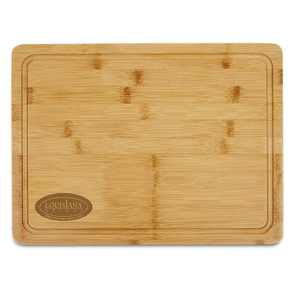 https://grillcollection.com/cdn/shop/files/Louisiana-Grills-40249-Magnetic-Wood-Cutting-Board_grande.jpg?v=1685867468