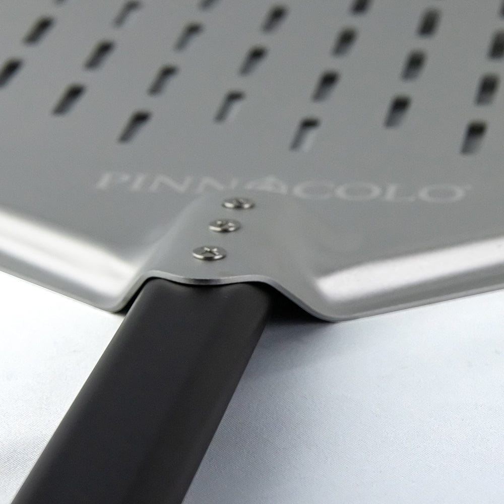 https://grillcollection.com/cdn/shop/files/Pinnacolo-12-Perforated-Aluminum-Pizza-Peel-With-Handle-5.jpg?v=1686370996&width=1445